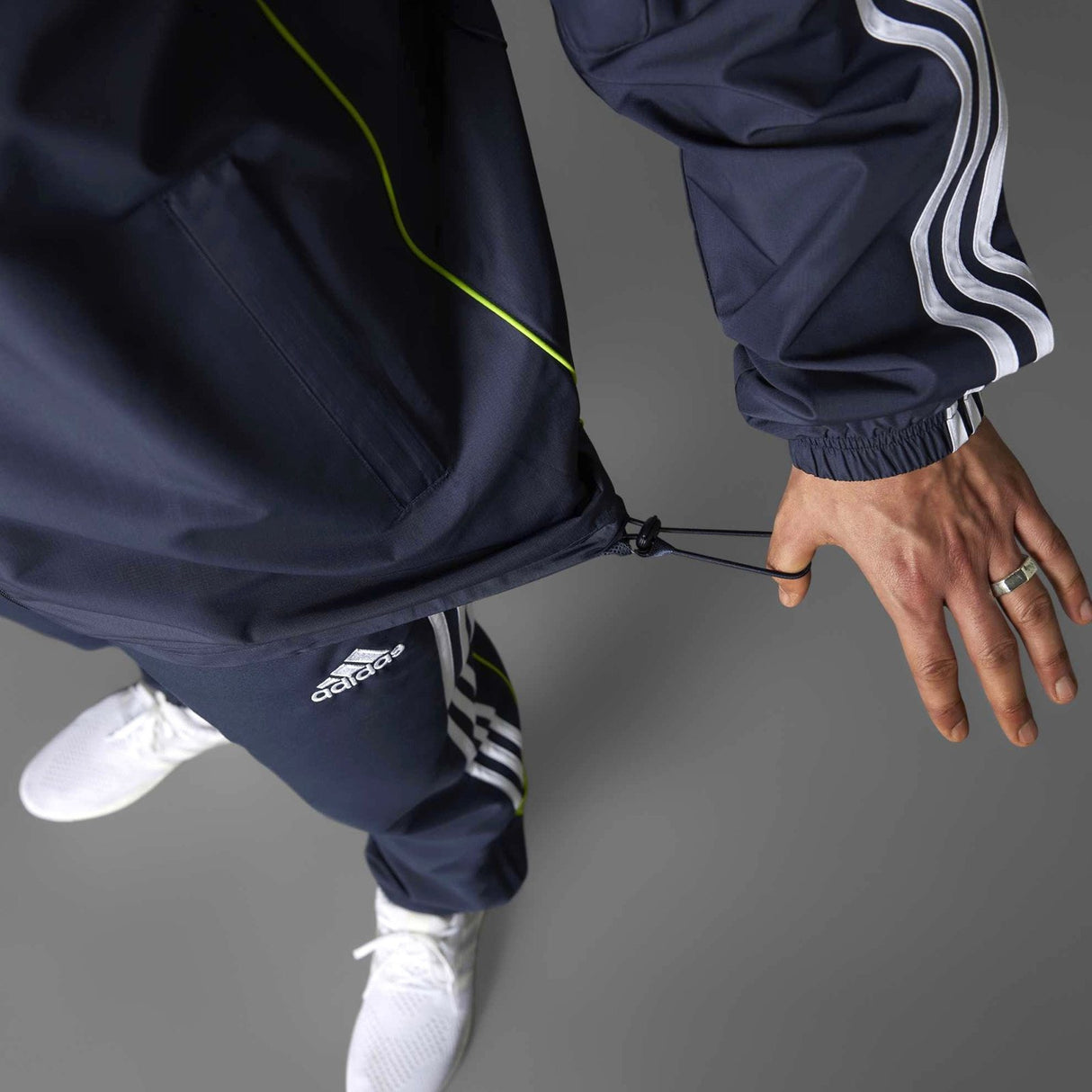 adidas Real Madrid Adults Full-Zip Windbreaker Jacket Model Waist View Grey Background