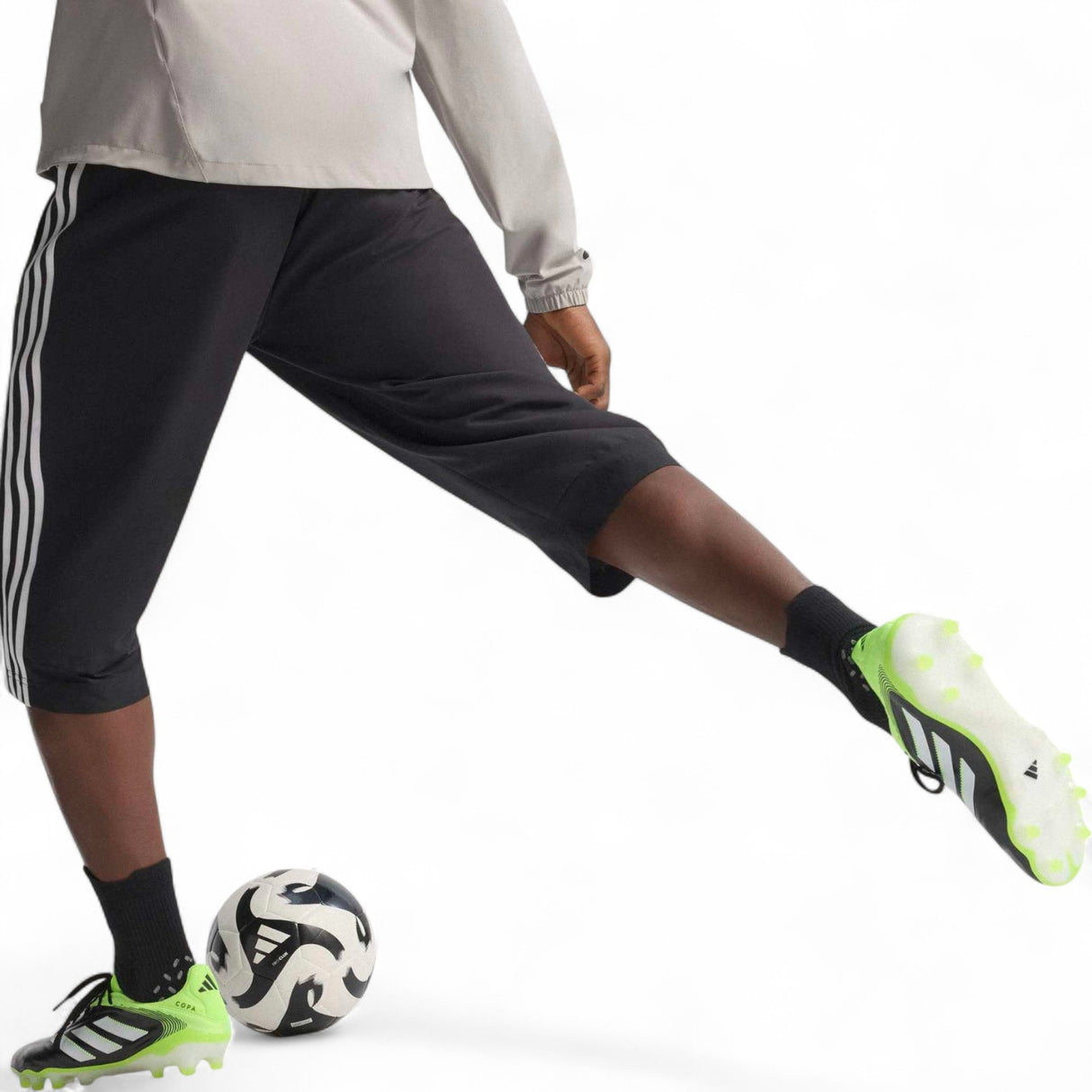 adidas Copa Pure III Elite Adults Firm Ground Rugby Boots Model Kicking Ball Close View