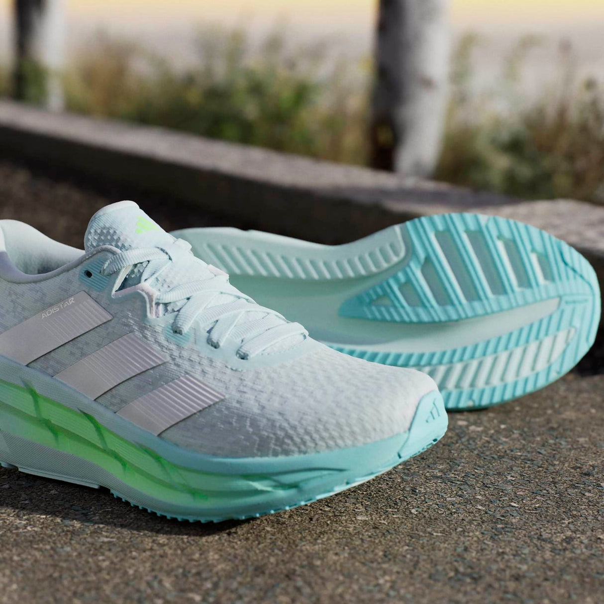 adidas Adistar 4 Womens Distance Lace Running Shoes Lifestyle Pair Outer and Sole View