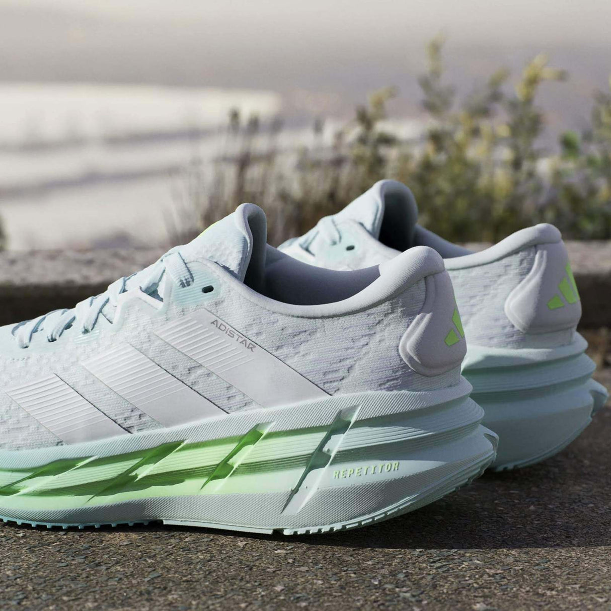 adidas Adistar 4 Womens Distance Lace Running Shoes Lifestyle Pair Close-Up Back Outer View