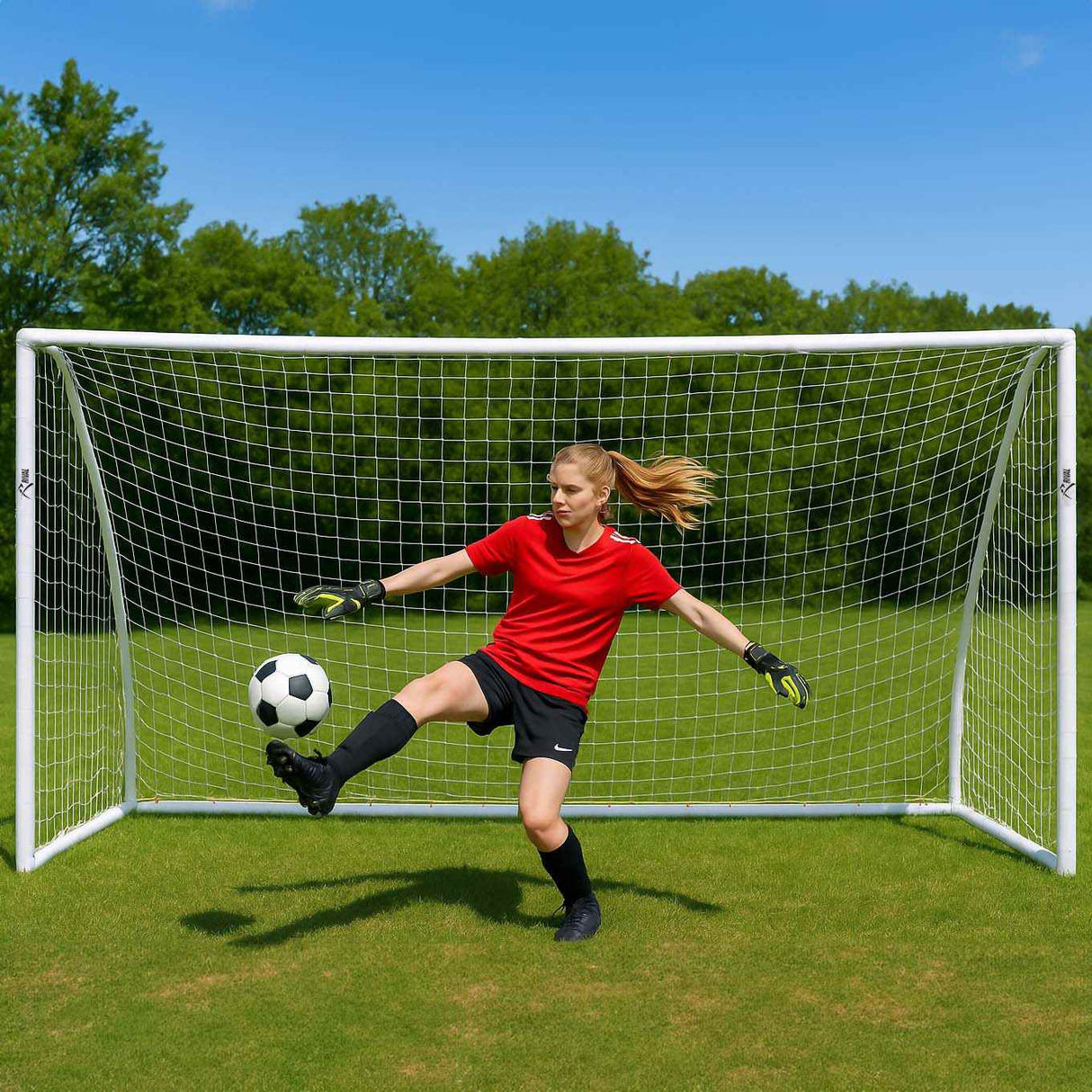 Rival 12ft x 6ft Outdoor PVC Football Goal Lifestyle Model In Goal View