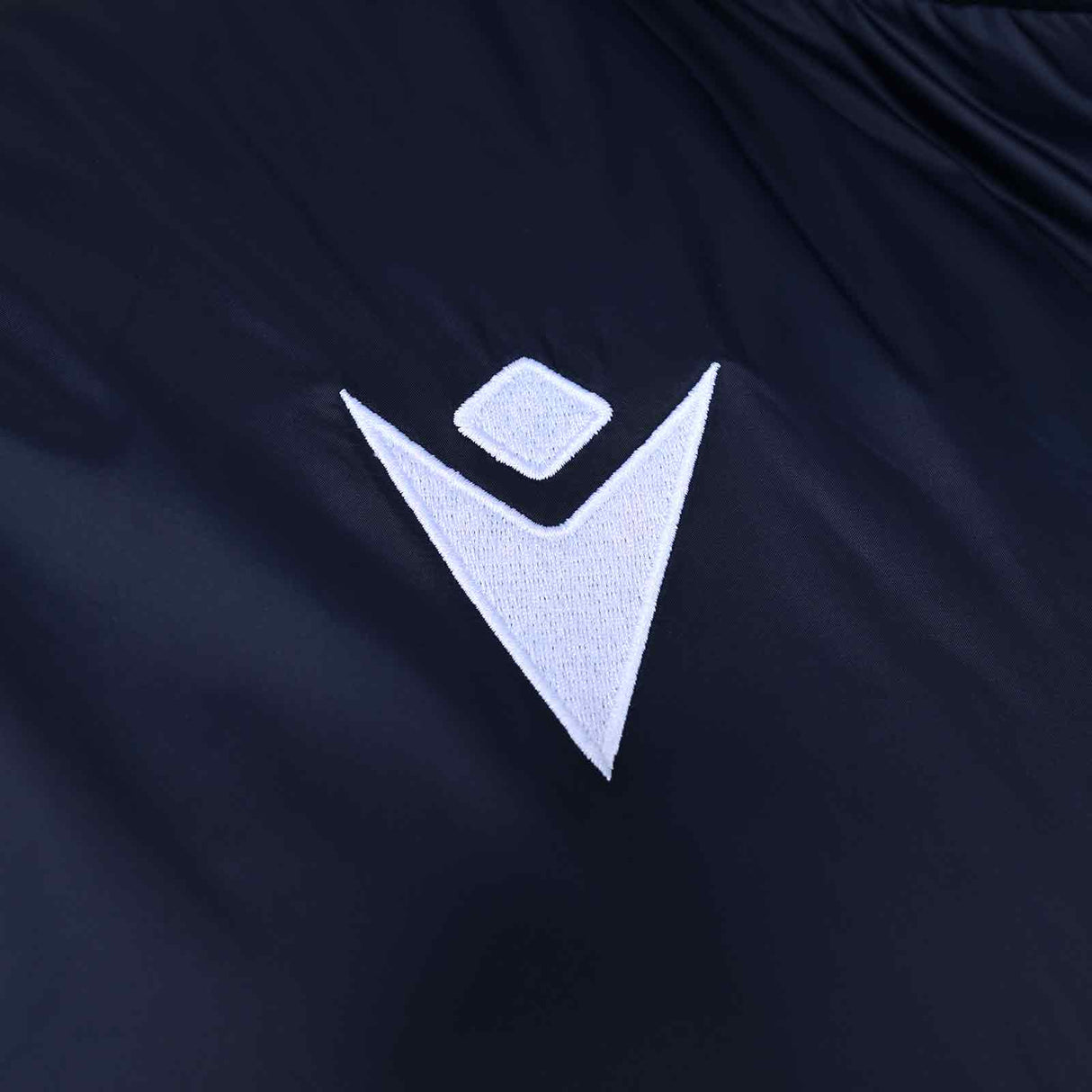 Macron Connacht Rugby 2025/26 Mens Padded Training Gilet Close-Up Macron Branding View