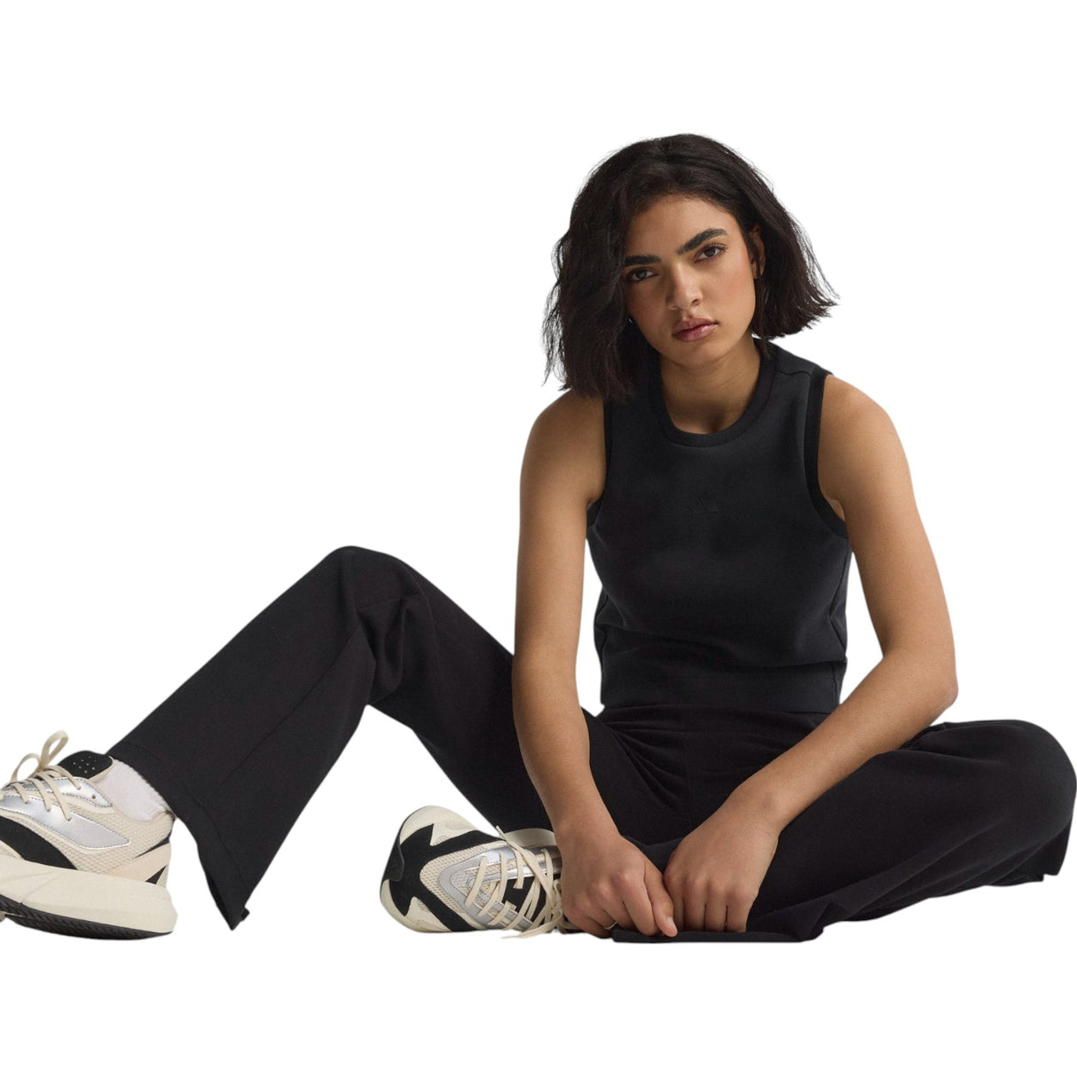 adidas All Season Womens Fleece Slim-Fit Flared Pants Model Sitting View
