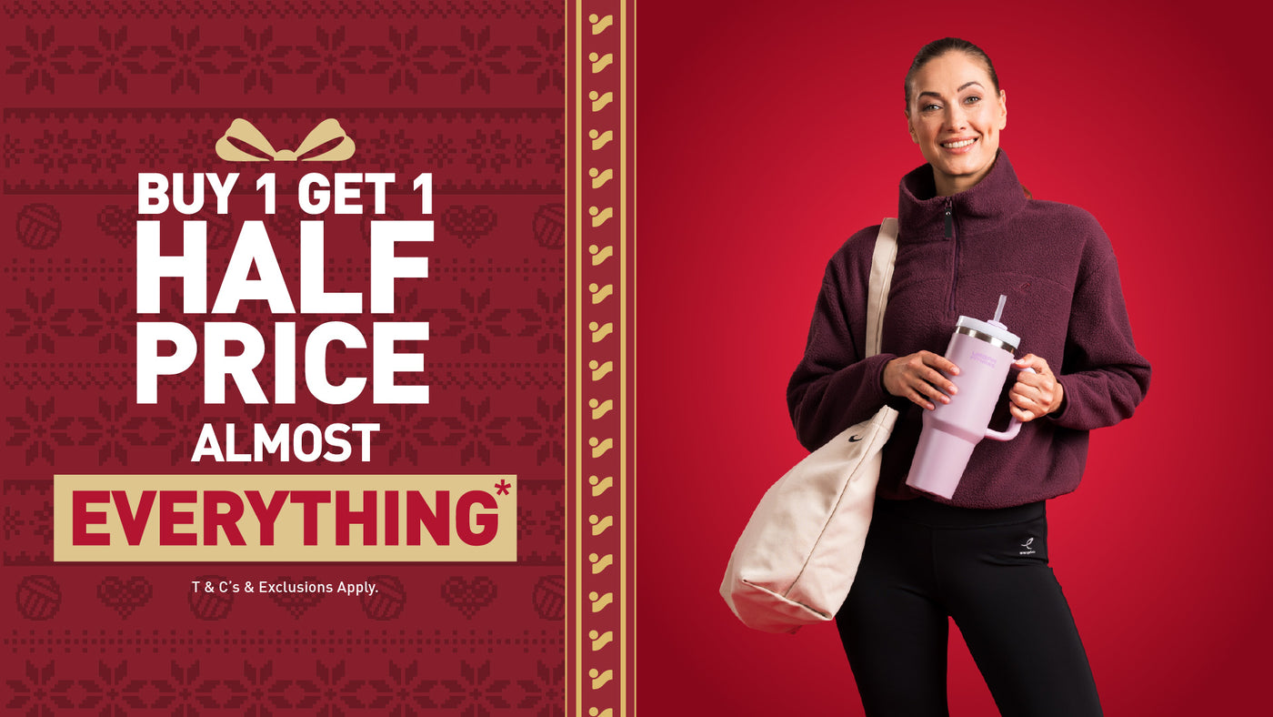 An image of the Intersport Elverys Christmas Black Friday sale offer, calling out Buy 1 Get 1 Half Price on almost everything. Features adults showcasing products as part of the promotion.