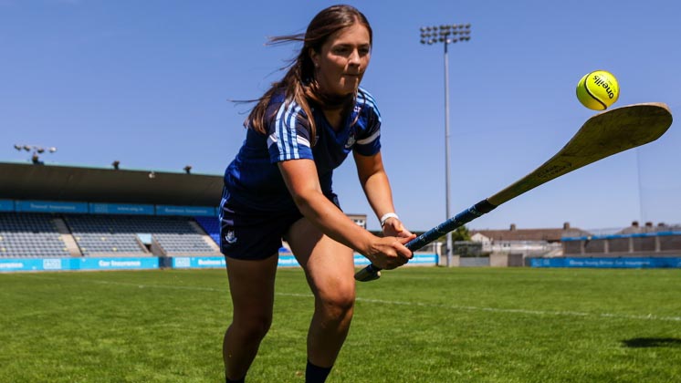 A Dublin player with a hurley