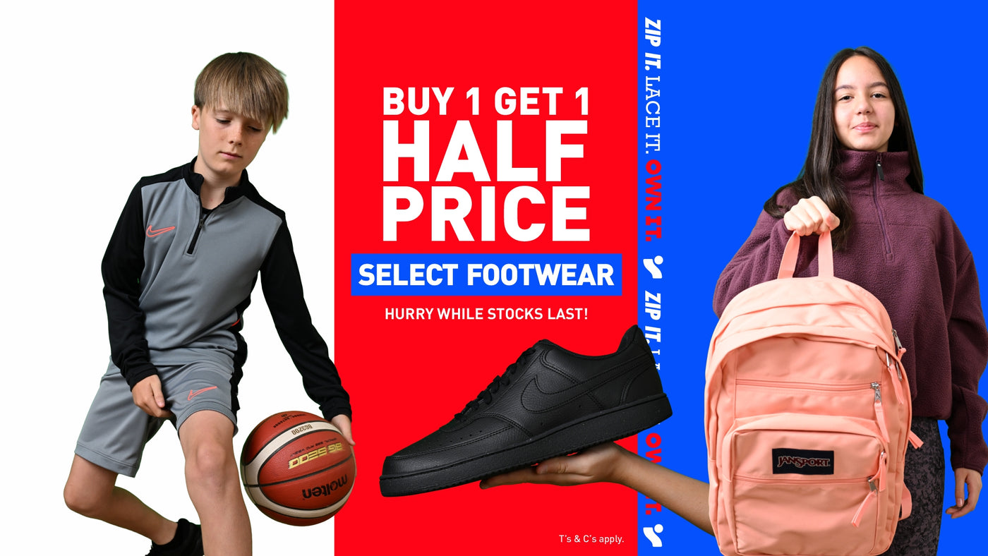 An image of Kids playing and getting ready for the new school term this September 2025. A black shoe held in hand while calling out the Buy 1 Get 1 Half Footwear sale.