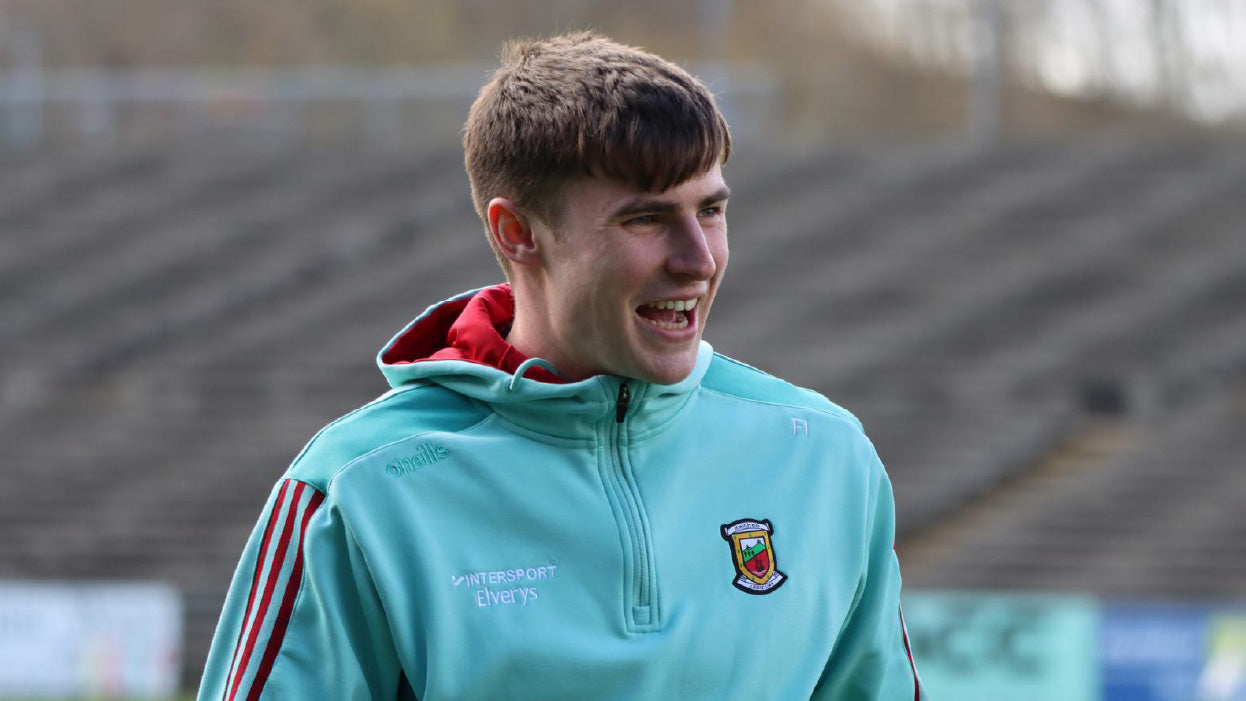 A Mayo player showcasing a half-zip from the exclusive 2025 GAA O'Neills Ballinrobe adult training range at Intersport Elverys