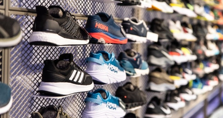 Running shoes on a display rack instore