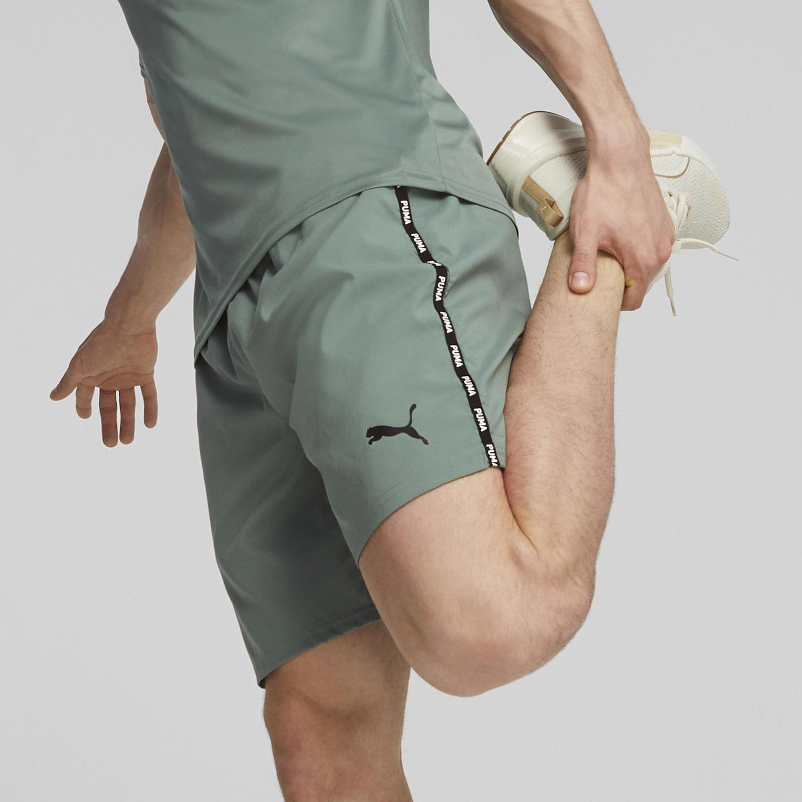 PUMA FIT TAPED 7INCH WOVEN MENS SHORTS