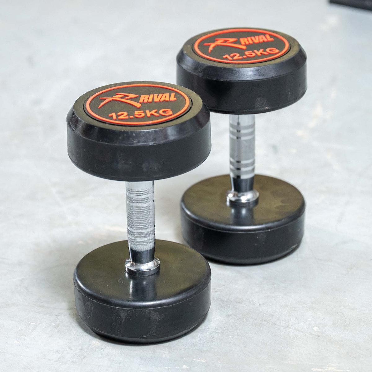 Rival Round Rubber Dumbbells - 12.5kg Pair