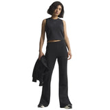 adidas All Season Womens Fleece Slim-Fit Flared Pants Model Full-Length Front View