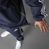 adidas Real Madrid Adults Full-Zip Windbreaker Jacket Model Waist View Grey Background