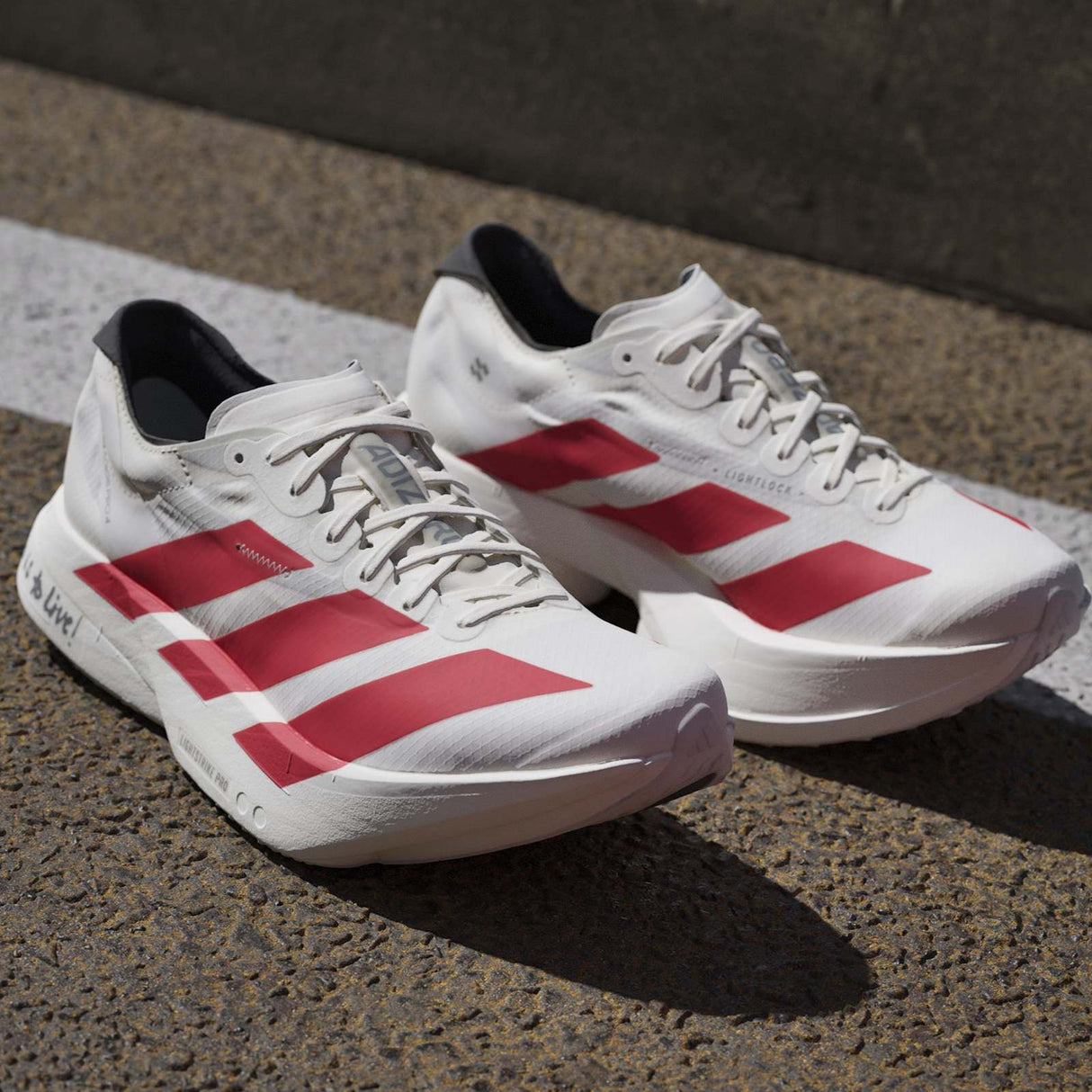 adidas Adizero Adios Pro 4 Womens Race Running Shoes