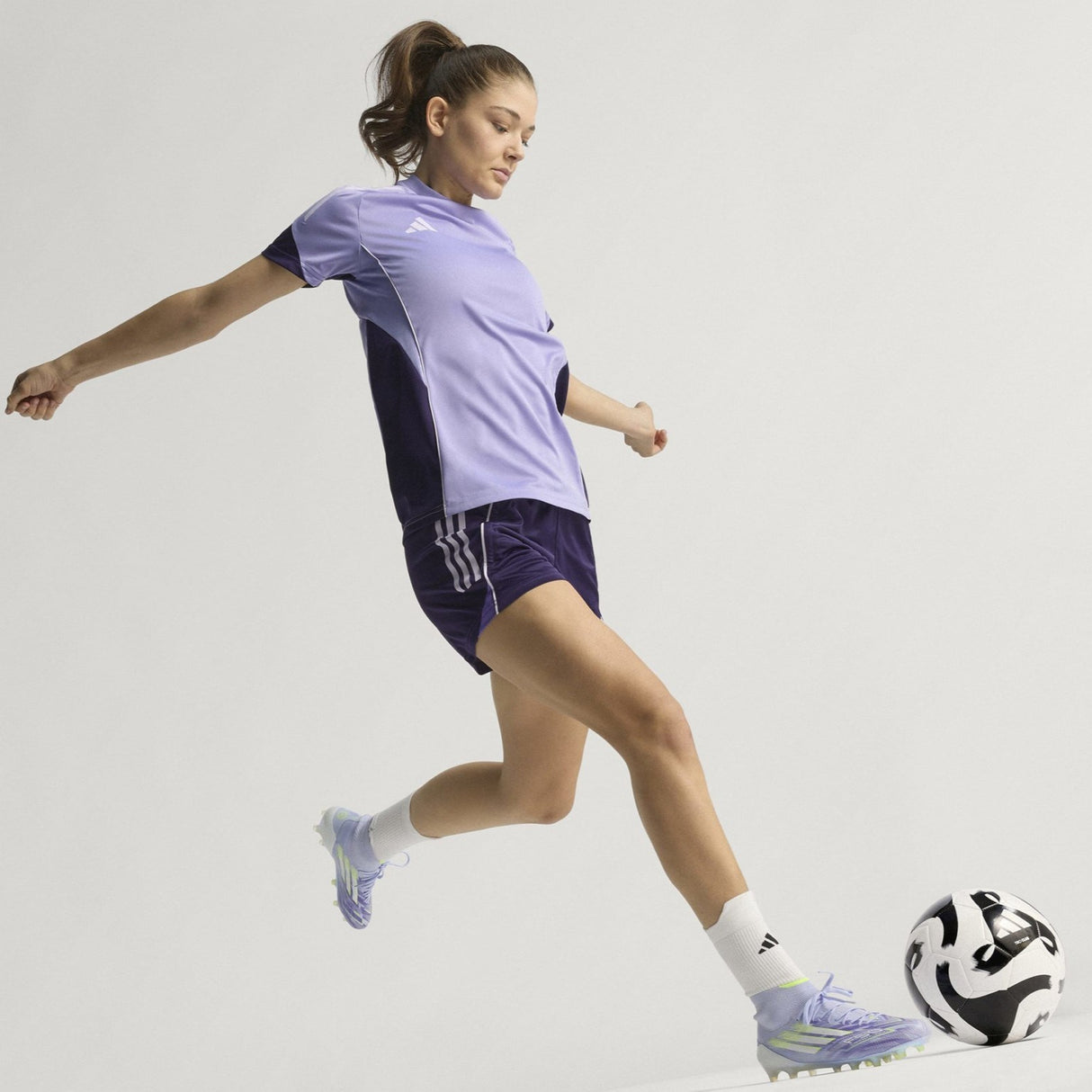 adidas F50 Sparkfusion Elite Womens Firm Ground Football Boots Model Full-Length Action Shot View