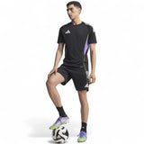 adidas F50 Elite Adults Lightweight Firm Ground Rugby Boots Model Standing with Ball Full-Length View
