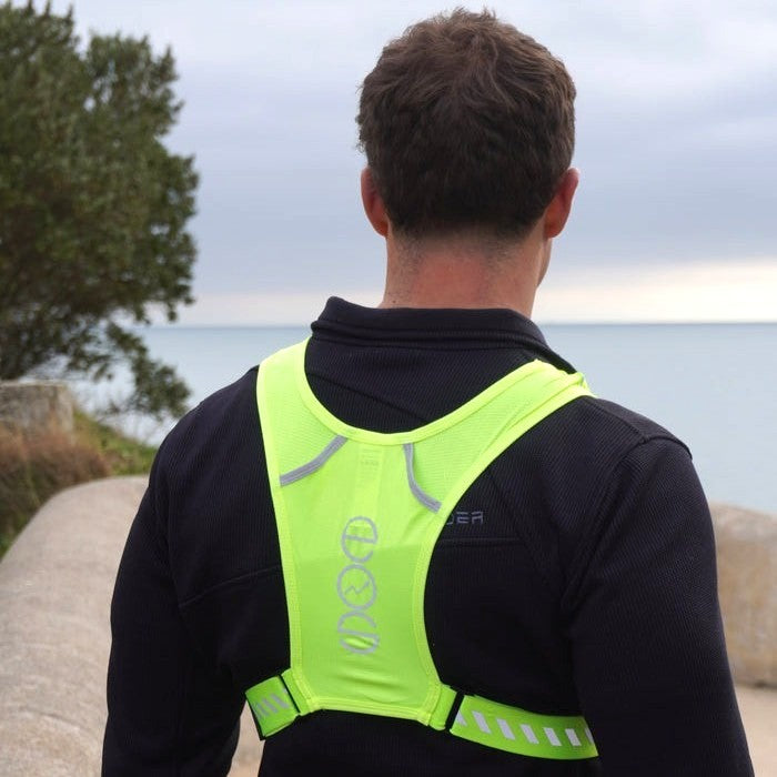 EOS Elite IlluminLight 2.0 Reflective Running Vest Model Back View Outdoor