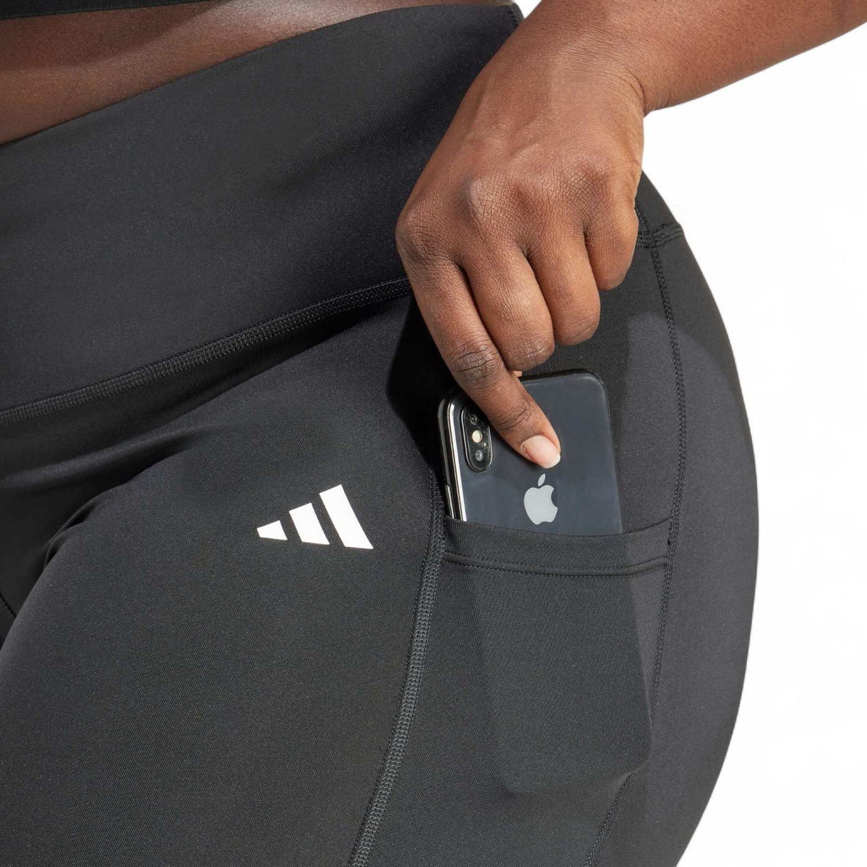 adidas Optime Essentials Plus-Size Womens Leggings Close-Up Model Pocket View