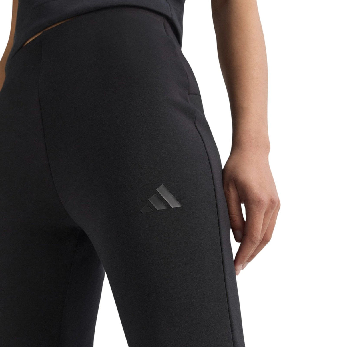 adidas All Season Womens Fleece Slim-Fit Flared Pants Model Close-Up Logo View
