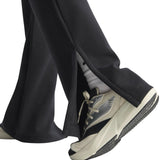 adidas All Season Womens Fleece Slim-Fit Flared Pants Model Close-Up Ankle View