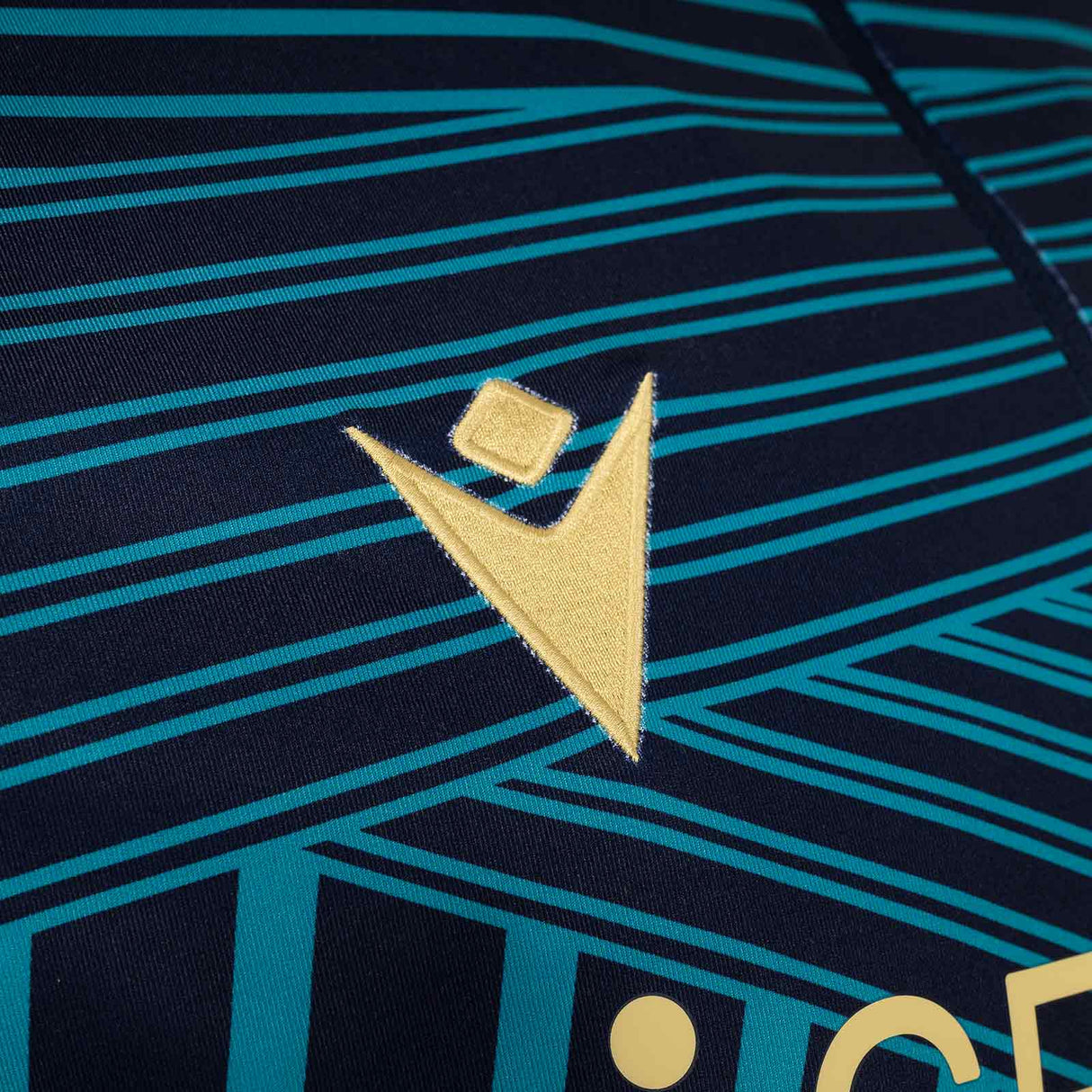 Macron Connacht Rugby 2025/26 Kids Warm-Up Training Top Close-Up Macron Branding View