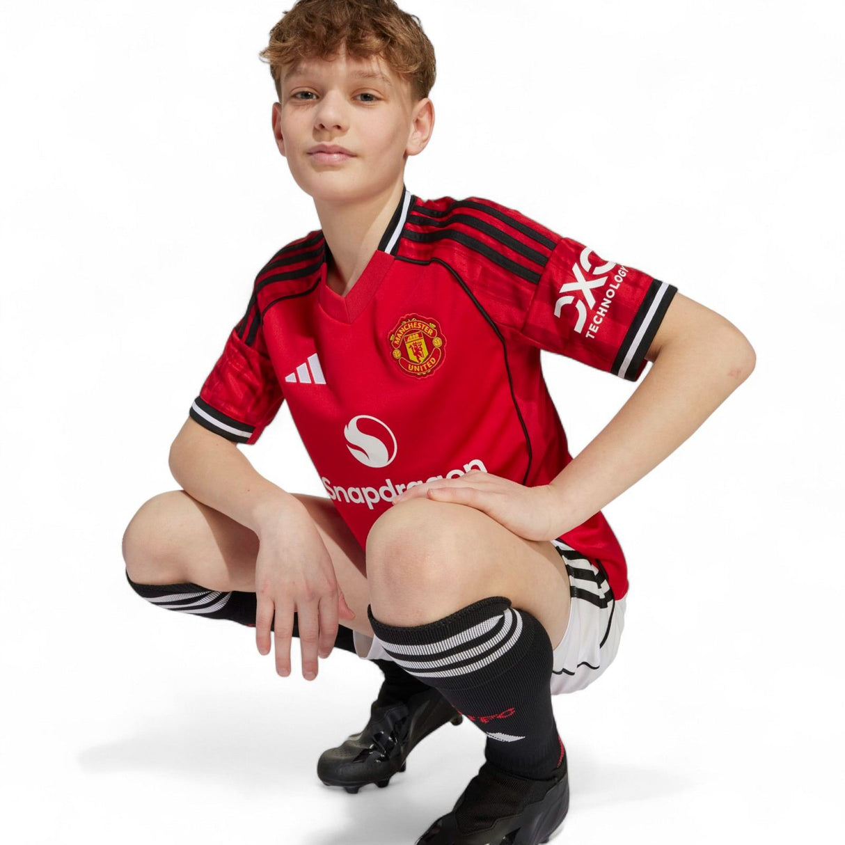 adidas Manchester United Football 2025/26 Kids Short Sleeved Home Jersey Model Kneeling Front View