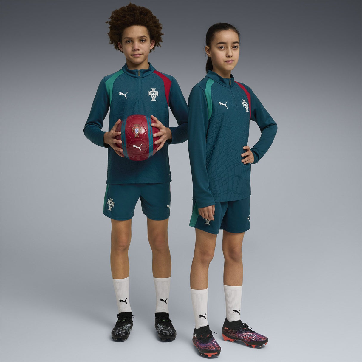 PUMA PORTUGAL WC26 KID TRAIN QZ TOP NAVY
