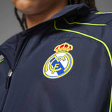adidas Real Madrid Adults Full-Zip Windbreaker Jacket Model Close-Up Team Crest View Grey Background