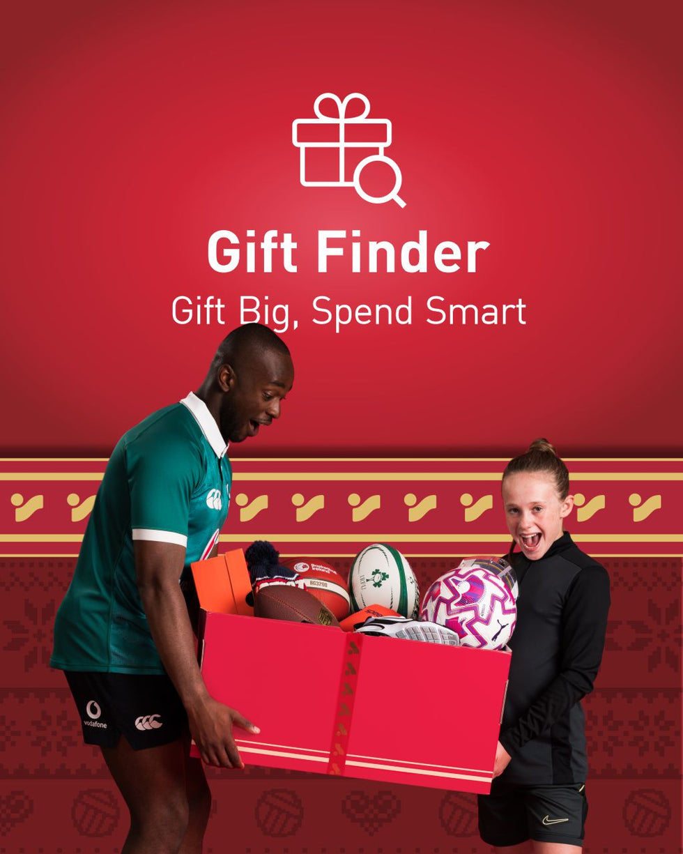 An image of a man & a girl holding a box of presents as part of the Intersport Elverys 2025 Christmas campaign.