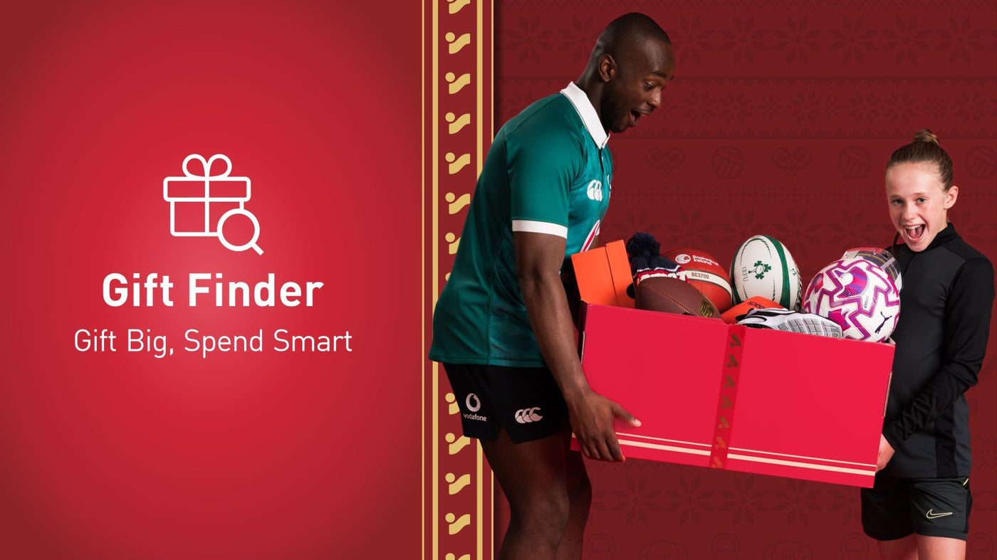 An image of a man & a girl holding a box of presents as part of the Intersport Elverys 2025 Christmas campaign.